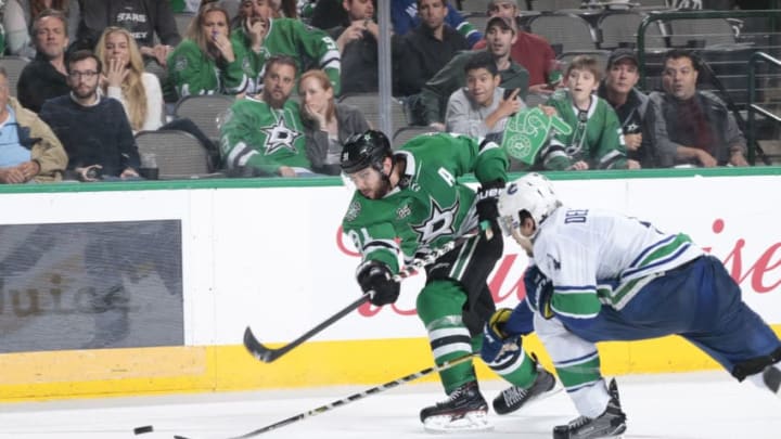 DALLAS, TX - MARCH 25: Tyler Seguin #91 of the Dallas Stars blasts a shot on goal against the Vancouver Canucks at the American Airlines Center on March 25, 2018 in Dallas, Texas. (Photo by Glenn James/NHLI via Getty Images) *** Local Caption *** Tyler Seguin