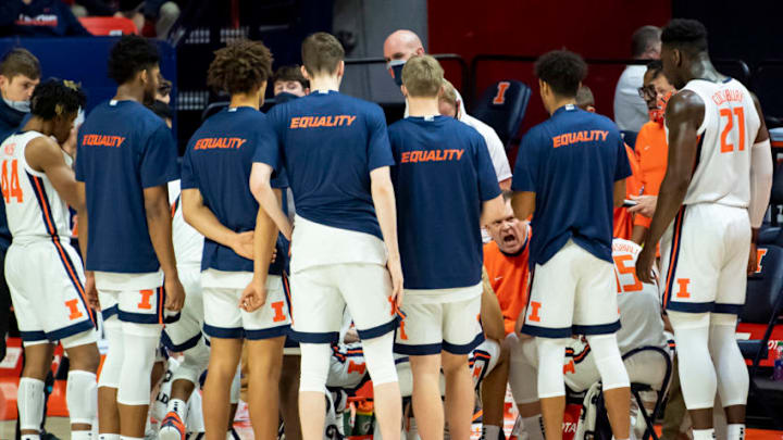 Dec 15, 2020; Champaign, Illinois, USA; Illinois Fighting Illini head coach Brad Underwood talks to his team during a timeout in the second half against the Minnesota Golden Gophers at the State Farm Center. Mandatory Credit: Patrick Gorski-USA TODAY Sports