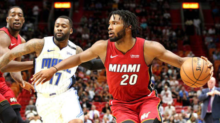 Miami Heat forward Justise Winslow drives to the basket against Orlando Magic forward Jonathon Simmons in the first quarter on Tuesday, Dec. 4, 2018 at AmericanAirlines Arena in Miami, Fla. (Pedro Portal/Miami Herald/TNS via Getty Images)