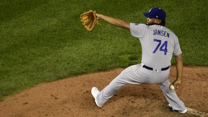WASHINGTON, DC - OCTOBER 06: Kenley Jansen #74 of the Los Angeles Dodgers pitches against the Washington Nationals in the ninth inning in Game 3 of the NLDS at Nationals Park on October 6, 2019 in Washington, DC. (Photo by Patrick McDermott/Getty Images)