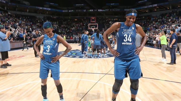 MINNEAPOLIS, MN – JULY 24: Guard Danielle Robinson #3 and center Sylvia Fowles #34 of the Minnesota Lynx celebrate after the game against the New York Liberty on July 24, 2018 at Target Center in Minneapolis, Minnesota. NOTE TO USER: User expressly acknowledges and agrees that, by downloading and or using this Photograph, user is consenting to the terms and conditions of the Getty Images License Agreement. Mandatory Copyright Notice: Copyright 2018 NBAE (Photo by David Sherman/NBAE via Getty Images)