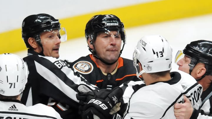 ANAHEIM, CA - JANUARY 19: Anaheim Ducks defenseman Francois Beauchemin (23) and Los Angeles Kings leftwing Kyle Clifford (13) exchange words near the Ducks goal in the first period of a game played on January 19, 2018 at the Honda Center in Anaheim, CA. (Photo by John Cordes/Icon Sportswire via Getty Images)