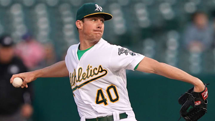 OAKLAND, CA - APRIL 22: Chris Bassitt #40 of the Oakland Athletics pitches against the Texas Rangers in the top of the first inning of a Major League Baseball game at Oakland-Alameda County Coliseum on April 22, 2019 in Oakland, California. (Photo by Thearon W. Henderson/Getty Images)