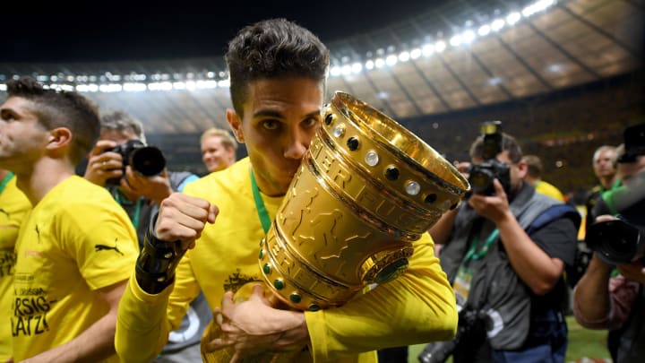 BERLIN, GERMANY – MAY 27: Marc Bartra of Dortmund lifts the trophy after winning the DFB Cup Final 2017 between Eintracht Frankfurt and Borussia Dortmund at Olympiastadion on May 27, 2017 in Berlin, Germany.. (Photo by Matthias Hangst/Bongarts/Getty Images)