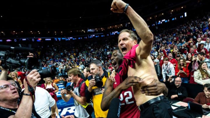 Arkansas head coach Eric Musselman celebrates the team's win over Kansas with Makhel Mitchell after an NCAA men's basketball tournament second round basketball game on Saturday, March 18, 2023, at Wells Fargo Arena, in Des Moines, Iowa.