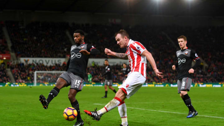 STOKE ON TRENT, ENGLAND - DECEMBER 14: Cuco Martina of Southampton (L) put pressure on Glenn Whelan of Stoke City (R) during the Premier League match between Stoke City and Southampton at Bet365 Stadium on December 14, 2016 in Stoke on Trent, England. (Photo by Michael Regan/Getty Images)