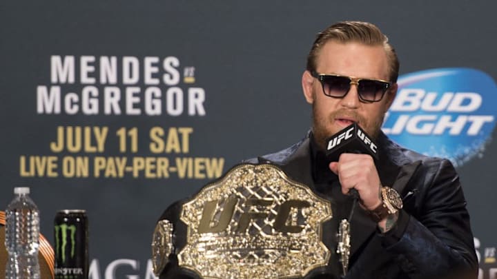 LAS VEGAS, NV - JULY 11: UFC interim featherweight champion Conor McGregor interacts with the media during the UFC 189 post fight press conference at the MGM Grand Garden Arena on July 11, 2015 in Las Vegas, Nevada. (Photo by Jeff Bottari/Zuffa LLC/Zuffa LLC via Getty Images)