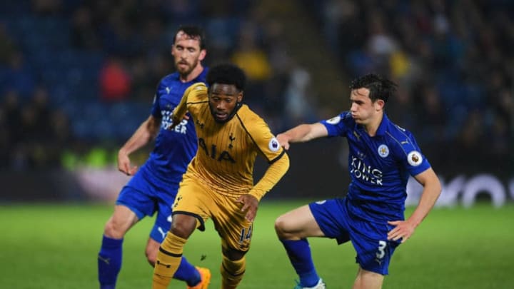 LEICESTER, ENGLAND - MAY 18: Georges-Kevin Nkoudou of Tottenham Hotspur evades Christian Fuchs and Ben Chilwell of Leicester City during the Premier League match between Leicester City and Tottenham Hotspur at The King Power Stadium on May 18, 2017 in Leicester, England. (Photo by Laurence Griffiths/Getty Images)