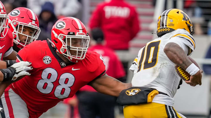 Nov 6, 2021; Athens, Georgia, USA; Georgia Bulldogs defensive lineman Jalen Carter (88) tackles Missouri Tigers quarterback Tyler Macon (10) during the first half at Sanford Stadium. Mandatory Credit: Dale Zanine-USA TODAY Sports