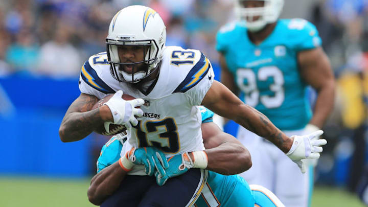 CARSON, CA - SEPTEMBER 17: Michael Thomas #31 of the Miami Dolphins tackles Keenan Allen #13 of the Los Angeles Chargers during the NFL game at the StubHub Center on September 17, 2017 in Carson, California. (Photo by Sean M. Haffey/Getty Images)