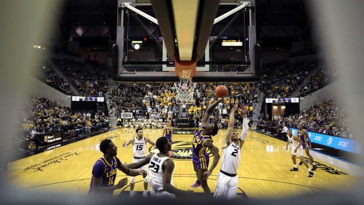 COLUMBIA, MISSOURI – JANUARY 26: Emmitt Williams #24 of the LSU Tigers and K.J. Santos #2 of the Missouri Tigers compete for a rebound during the game at Mizzou Arena on January 26, 2019 in Columbia, Missouri. (Photo by Jamie Squire/Getty Images)