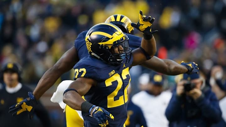 Oct 22, 2016; Ann Arbor, MI, USA; Michigan Wolverines running back Karan Higdon (22) celebrates his touchdown in the second half against the Illinois Fighting Illini at Michigan Stadium. Michigan won 41-8. Mandatory Credit: Rick Osentoski-USA TODAY Sports