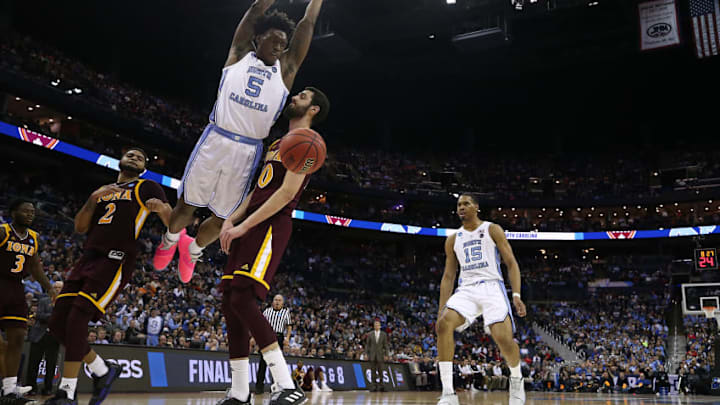 COLUMBUS, OHIO - MARCH 22: Nassir Little #5 of the North Carolina Tar Heels dunks against Andrija Ristanovic #10 of the Iona Gaels during the second half of the game in the first round of the 2019 NCAA Men's Basketball Tournament at Nationwide Arena on March 22, 2019 in Columbus, Ohio. (Photo by Gregory Shamus/Getty Images) COLUMBUS, OHIO - MARCH 22: Nassir Little #5 of the North Carolina Tar Heels dunks against Andrija Ristanovic #10 of the Iona Gaels during the second half of the game in the first round of the 2019 NCAA Men's Basketball Tournament at Nationwide Arena on March 22, 2019 in Columbus, Ohio. (Photo by Gregory Shamus/Getty Images)