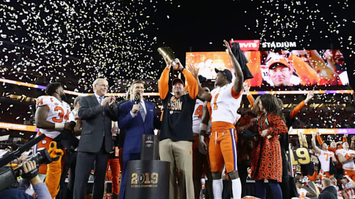 SANTA CLARA, CA - JANUARY 07: Head coach Dabo Swinney and Trayvon Mullen #1 of the Clemson Tigers celebrate their teams 44-16 win over the Alabama Crimson Tide with the trophy in the CFP National Championship presented by AT&T at Levi's Stadium on January 7, 2019 in Santa Clara, California. (Photo by Ezra Shaw/Getty Images)