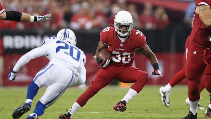 GLENDALE, AZ - NOVEMBER 24: Running back Andre Ellington No. 38 of the Arizona Cardinals rushes the football against the Indianapolis Colts during the NFL game at the University of Phoenix Stadium on November 24, 2013 in Glendale, Arizona. The Cardinals defeated the Colts 40-11. (Photo by Christian Petersen/Getty Images)