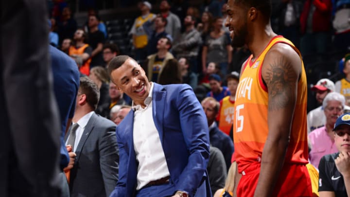 DENVER, CO - FEBRUARY 28: Dante Exum #11 and Derrick Favors #15 of the Utah Jazz talk during the game against the Denver Nuggets on February 28, 2019 at the Pepsi Center in Denver, Colorado. Copyright 2019 NBAE (Photo by Bart Young/NBAE via Getty Images)