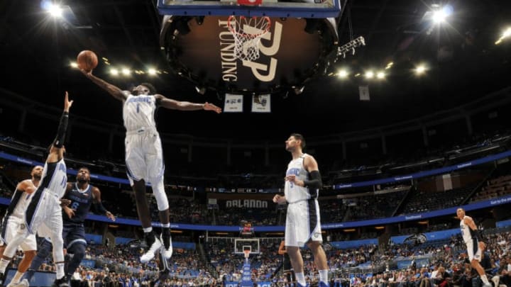 ORLANDO, FL - OCTOBER 10: Jonathan Isaac #1 of the Orlando Magic rebounds the ball against the Memphis Grizzlies during a pre-season game on October 10, 2018 at Amway Center in Orlando, Florida. NOTE TO USER: User expressly acknowledges and agrees that, by downloading and or using this photograph, User is consenting to the terms and conditions of the Getty Images License Agreement. Mandatory Copyright Notice: Copyright 2018 NBAE (Photo by Fernando Medina/NBAE via Getty Images)