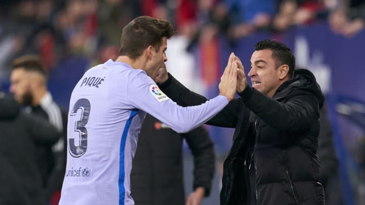 Gerard Pique and Xavi Hernandez of Barcelona. (Photo by Quality Sport Images/Getty Images)