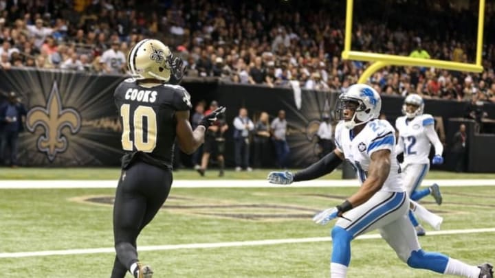 Dec 21, 2015; New Orleans, LA, USA; New Orleans Saints wide receiver Brandin Cooks (10) makes a 27-yard touchdown catch while defended by Detroit Lions cornerback Nevin Lawson (24) in the third quarter of the game at the Mercedes-Benz Superdome. Mandatory Credit: Chuck Cook-USA TODAY Sports