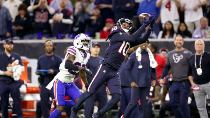HOUSTON, TEXAS - JANUARY 04: DeAndre Hopkins #10 of the Houston Texans catches a 41-yard pass against Tre'Davious White #27 of the Buffalo Bills during the fourth quarter of the AFC Wild Card Playoff game at NRG Stadium on January 04, 2020 in Houston, Texas. (Photo by Christian Petersen/Getty Images)