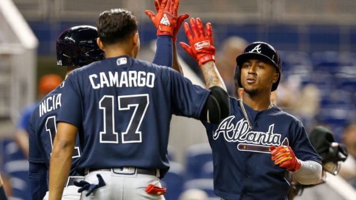 MIAMI, FL - MAY 10: Ozzie Albies #1 of the Atlanta Braves celebrates with teammates after hitting a grand slam against the Miami Marlins in the sixth inning at Marlins Park on May 10, 2018 in Miami, Florida. (Photo by Michael Reaves/Getty Images)