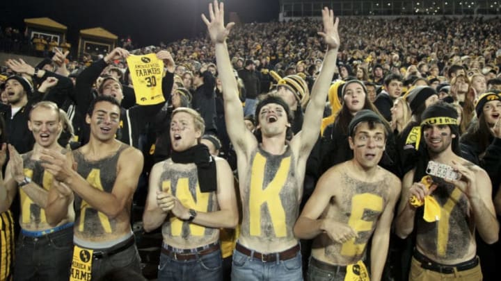 IOWA CITY, IA - NOVEMBER 14: Fans of the Iowa Hawkeyes celebrate after the match-up against the Minnesota Gophers on November 14, 2015 at Kinnick Stadium, in Iowa City, Iowa. (Photo by Matthew Holst/Getty Images)