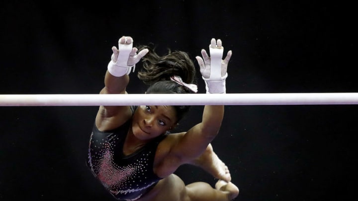 KANSAS CITY, MISSOURI - AUGUST 11: Simone Biles warms up on the uneven bars prior to the Women's Senior competition of the 2019 U.S. Gymnastics Championships at the Sprint Center on August 11, 2019 in Kansas City, Missouri. (Photo by Jamie Squire/Getty Images)