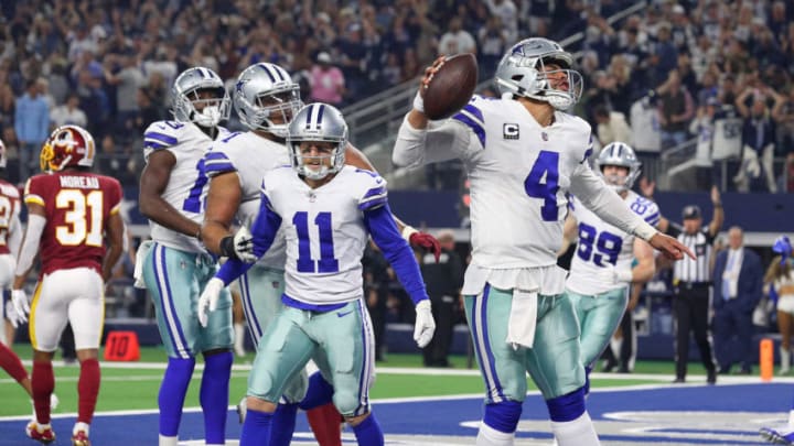 ARLINGTON, TEXAS - NOVEMBER 22: Dak Prescott #4 of the Dallas Cowboys celebrates a fourth quarter touchdown against the Washington Redskins at AT&T Stadium on November 22, 2018 in Arlington, Texas. (Photo by Richard Rodriguez/Getty Images)