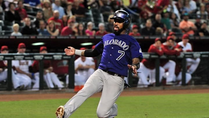 Sep 29, 2015; Phoenix, AZ, USA; Colorado Rockies shortstop Jose Reyes (7) scores on a sacrifice fly by third baseman Nolan Arenado (not pictured) during the first inning against the Arizona Diamondbacks at Chase Field. Mandatory Credit: Matt Kartozian-USA TODAY Sports