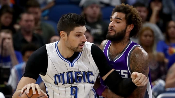 ORLANDO, FL – NOVEMBER 03: Nikola Vucevic #9 of the Orlando Magic is defended by Willie Cauley-Stein #00 of the Sacramento Kings during the game at Amway Center on November 3, 2016 in Orlando, Florida. NOTE TO USER: User expressly acknowledges and agrees that, by downloading and or using this photograph, User is consenting to the terms and conditions of the Getty Images License Agreement. (Photo by Sam Greenwood/Getty Images)