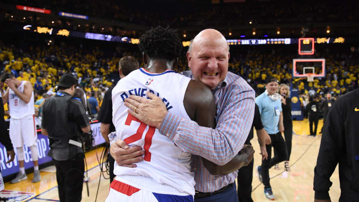 OAKLAND, CA – APRIL 24: Patrick Beverley #21 and Steve Ballmer, owner of the LA Clippers, hug after Game Five of Round One against the Golden State Warriors during the 2019 NBA Playoffs on April 24, 2019 at ORACLE Arena in Oakland, California. NOTE TO USER: User expressly acknowledges and agrees that, by downloading and/or using this photograph, user is consenting to the terms and conditions of Getty Images License Agreement. Mandatory Copyright Notice: Copyright 2019 NBAE (Photo by Noah Graham/NBAE via Getty Images)