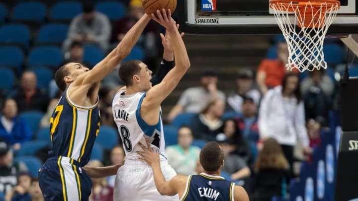 Mar 30, 2015; Minneapolis, MN, USA; Utah Jazz center Rudy Gobert (27) fouls Minnesota Timberwolves guard Zach LaVine (8) in the fourth quarter at Target Center. The Utah Jazz beat the Minnesota Timberwolves 104-84. Mandatory Credit: Brad Rempel-USA TODAY Sports