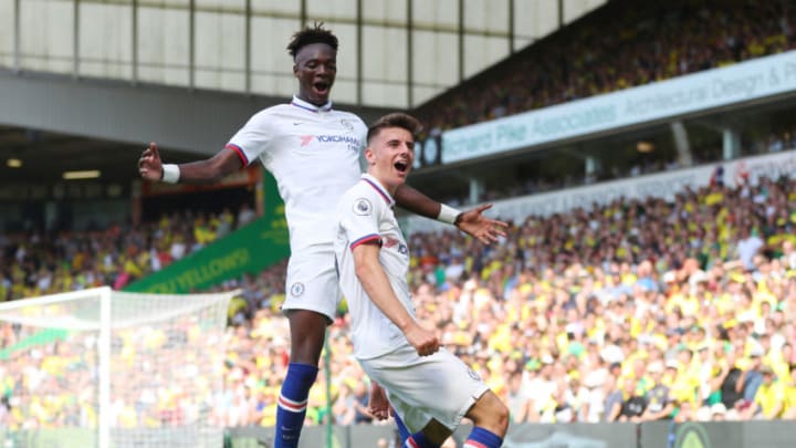 NORWICH, ENGLAND - AUGUST 24: Mason Mount of Chelsea celebrates scoring his teams second goal with Tammy Abraham during the Premier League match between Norwich City and Chelsea FC at Carrow Road on August 24, 2019 in Norwich, United Kingdom. (Photo by Catherine Ivill/Getty Images)