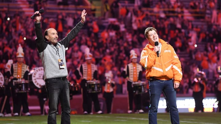 Lee Greenwood and his son Parker Greenwood perform “God Bless the USA” during the halftime show of the NCAA football game between the Tennessee Volunteers and South Alabama Jaguars in Knoxville, Tenn. on Saturday, November 20, 2021.Utvsal1120