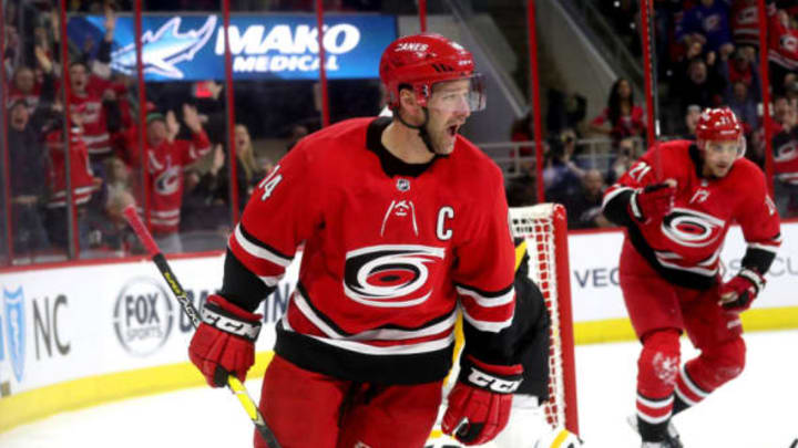 RALEIGH, NC – MARCH 19: Justin Williams #14 of the Carolina Hurricanes scores the game tying goal in regulation during an NHL game against the Pittsburgh Penguins on March 19, 2019 at PNC Arena in Raleigh, North Carolina. (Photo by Gregg Forwerck/NHLI via Getty Images)