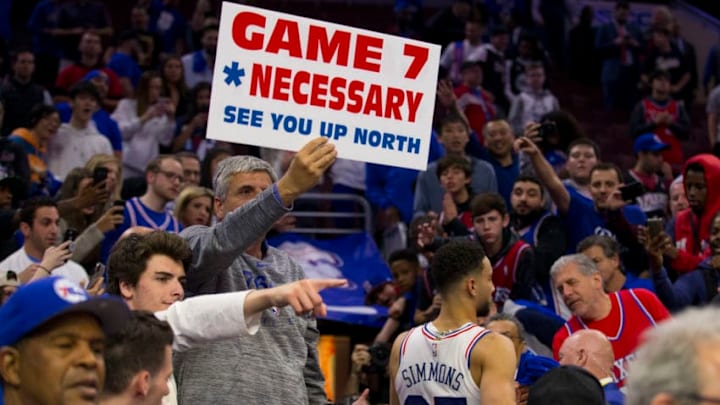 PHILADELPHIA, PA - MAY 09: Ben Simmons #25 of the Philadelphia 76ers walks to the locker room as a fan holds up a sign after Game Six of the Eastern Conference Semifinals against the Toronto Raptors at the Wells Fargo Center on May 9, 2019 in Philadelphia, Pennsylvania. The 76ers defeated the Raptors 112-101. NOTE TO USER: User expressly acknowledges and agrees that, by downloading and or using this photograph, User is consenting to the terms and conditions of the Getty Images License Agreement. (Photo by Mitchell Leff/Getty Images)