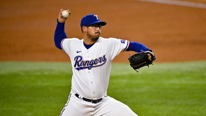 Apr 4, 2023; Arlington, Texas, USA; Texas Rangers starting pitcher Dane Dunning (33) pitches in relief against the Baltimore Orioles during the third inning at Globe Life Field. Mandatory Credit: Jerome Miron-USA TODAY Sports