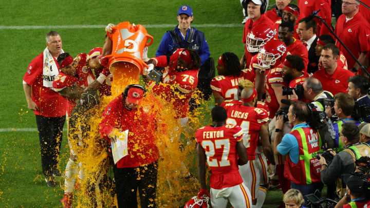 MIAMI, FLORIDA – FEBRUARY 02: Head coach Andy Reid of the Kansas City Chiefs gets dunked in Gatorade after defeating the San Francisco 49ers 31-20 in Super Bowl LIV at Hard Rock Stadium on February 02, 2020 in Miami, Florida. (Photo by Mike Ehrmann/Getty Images)