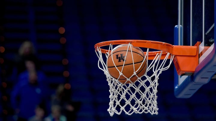 LEXINGTON, KY – DECEMBER 31: A basketball is shot through into a basket. (Photo by Bobby Ellis/Getty Images)