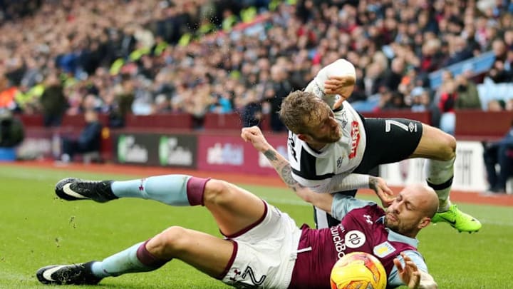 BIRMINGHAM, ENGLAND - FEBRUARY 25: Alan Hutton of Aston Villa and Johnny Russell of Derby County during the Sky Bet Championship match between Aston Villa and Derby County at Villa Park on February 25, 2017 in Birmingham, England. (Photo by James Baylis - AMA/Getty Images)