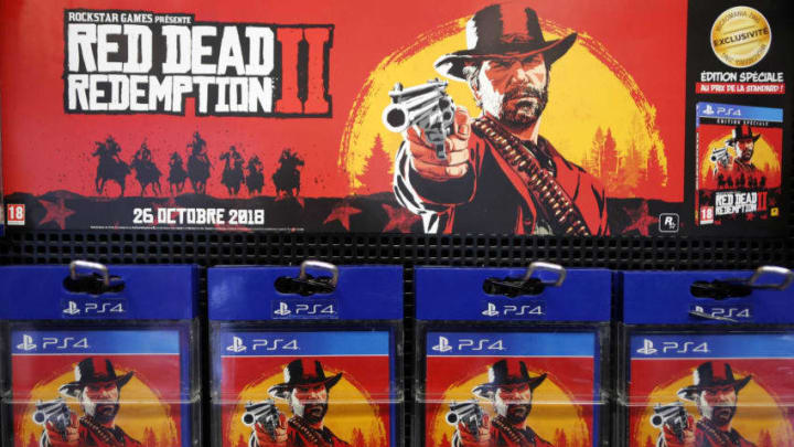 PARIS, FRANCE - OCTOBER 27: Red Dead Redemption 2 (RD 2) video games for Sony PlayStation PS4 developed by Rockstar Studios and published by Rockstar Games are displayed inside a shop during the 'Paris Games Week' on October 27, 2018 in Paris, France. 'Paris Games Week' is an international trade fair for video games and runs from October 26 to 31, 2018. (Photo by Chesnot/Getty Images)