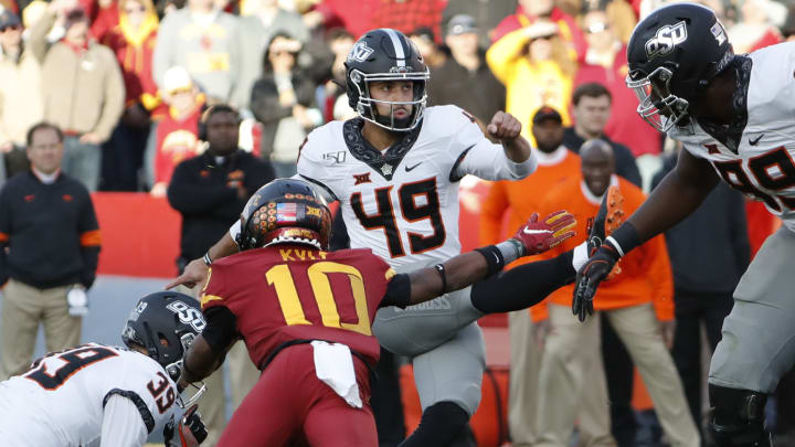 AMES, IA – OCTOBER 26: Place kicker Matt Ammendola #49 of the Oklahoma State Cowboys kicks a field goal as defensive back Tayvonn Kyle #10 of the Iowa State Cyclones blocks in the second half of play at Jack Trice Stadium on October 26, 2019 in Ames, Iowa. The Oklahoma State Cowboys won 34-27 over the Iowa State Cyclones.(Photo by David Purdy/Getty Images)