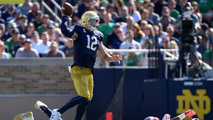 SOUTH BEND, INDIANA - SEPTEMBER 14: Ian Book #12 of the Notre Dame Fighting Irish passes the football in the second quarter against the New Mexico Lobos at Notre Dame Stadium on September 14, 2019 in South Bend, Indiana. (Photo by Quinn Harris/Getty Images)