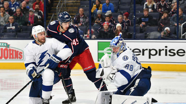 COLUMBUS, OH - FEBRUARY 18: Goaltender Andrei Vasilevskiy #88 of the Tampa Bay Lightning makes a glove save as Dan Girardi #5 of the Tampa Bay Lightning and Lukas Sedlak #45 of the Columbus Blue Jackets battle for position during the third period of a game on February 18, 2019 at Nationwide Arena in Columbus, Ohio. (Photo by Jamie Sabau/NHLI via Getty Images)