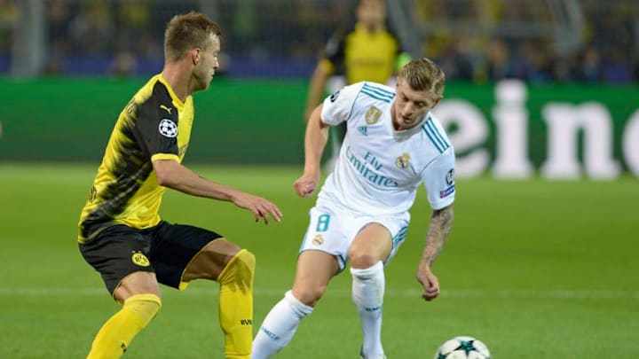 DORTMUND, GERMANY - SEPTEMBER 26: Andrey Yarmolenko of Dortmund , Toni Kroos of Real Madrid battle for the ball during the UEFA Champions League group H match between Borussia Dortmund and Real Madrid at Signal Iduna Park on September 26, 2017 in Dortmund, Germany. (Photo by TF-Images/TF-Images via Getty Images)