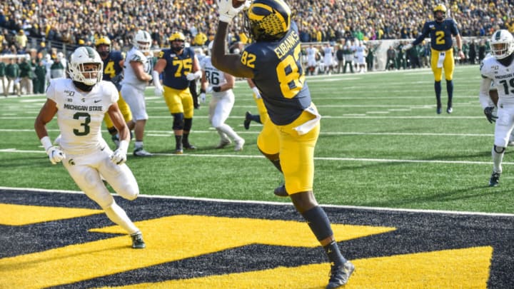 ANN ARBOR, MICHIGAN - OCTOBER 26: Nick Eubanks #82 of the Michigan Wolverines catches a pass for a touchdown during the first half of a college football game against the Michigan State Spartans at Michigan Stadium on November 16, 2019 in Ann Arbor, MI. (Photo by Aaron J. Thornton/Getty Images)