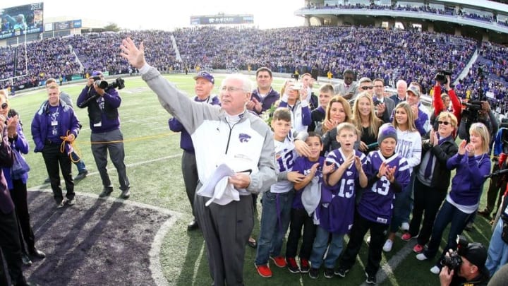 Nov 26, 2016; Manhattan, KS, USA; Kansas State Wildcats head coach Bill Snyder is surrounded by his family after a game against the Kansas Jayhawks at Bill Snyder Family Football Stadium. Snyder was recognized for earning his 200th career victory. The Wildcats won the game, 34-19. Mandatory Credit: Scott Sewell-USA TODAY Sports