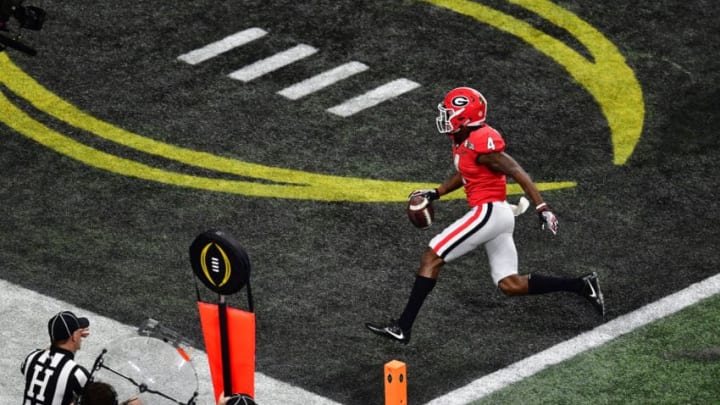 ATLANTA, GA - JANUARY 08: Mecole Hardman #4 of the Georgia Bulldogs carries the ball for a touchdown against the Alabama Crimson Tide in the CFP National Championship presented by AT&T at Mercedes-Benz Stadium on January 8, 2018 in Atlanta, Georgia. (Photo by Scott Cunningham/Getty Images)