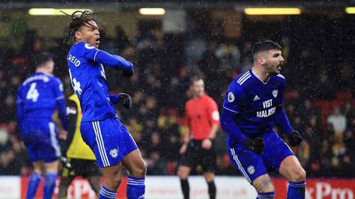 WATFORD, ENGLAND - DECEMBER 15: Bobby Reid of Cardiff City celebrates after scoring his team's second goal with Callum Paterson of Cardiff City during the Premier League match between Watford FC and Cardiff City at Vicarage Road on December 15, 2018 in Watford, United Kingdom. (Photo by Marc Atkins/Getty Images)