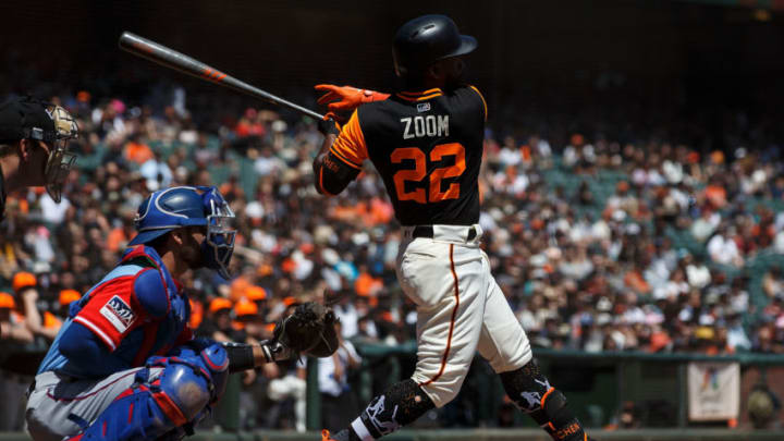 SAN FRANCISCO, CA - AUGUST 26: Andrew McCutchen #22 of the San Francisco Giants at bat against the Texas Rangers during the first inning at AT&T Park on August 26, 2018 in San Francisco, California. The San Francisco Giants defeated the Texas Rangers 3-1. All players across MLB will wear nicknames on their backs as well as colorful, non-traditional uniforms featuring alternate designs inspired by youth-league uniforms during Players Weekend. (Photo by Jason O. Watson/Getty Images)